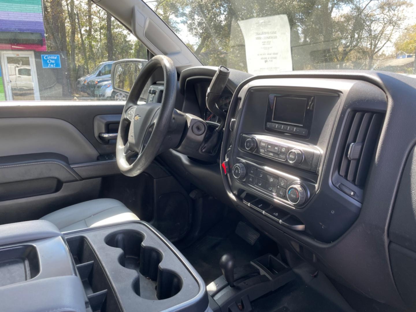 2015 WHITE CHEVROLET SILVERADO 2500H WORK TRUCK (1GC1KUEG7FF) with an 6.0L engine, Automatic transmission, located at 5103 Dorchester Rd., Charleston, SC, 29418-5607, (843) 767-1122, 36.245171, -115.228050 - Local Trade-in with Easy Clean Vinyl Interior, Backup Camera, AM/FM/AUX, Spacious Rear Seat, Power Windows, Power Locks, Power Mirrors, Utility Cab with Storage All Around, Pull Out Bed Storage, Ladder Rack, Safety Strobe Lights, Keyless Entry, Tow Package with Brake Assist, 4-Wheel Drive, Brush Gua - Photo#8